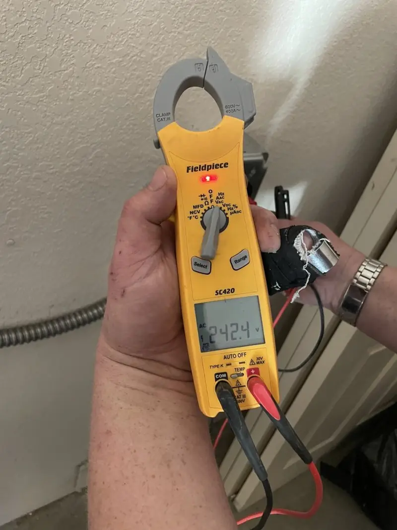 Voltage testing with clamp meter during Circuit Breaker Repair in Minersville